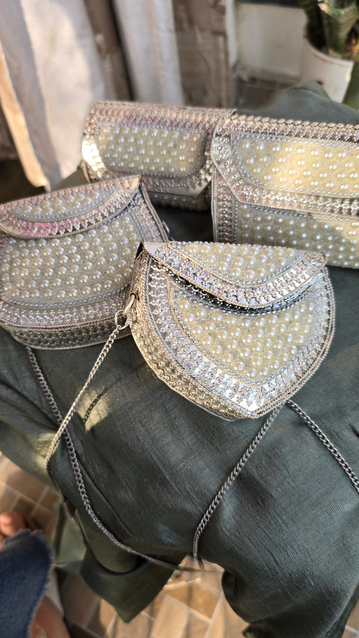 Exquisite Handcrafted PearlEmbellished Silver Metal Clutch with Detachable Chain