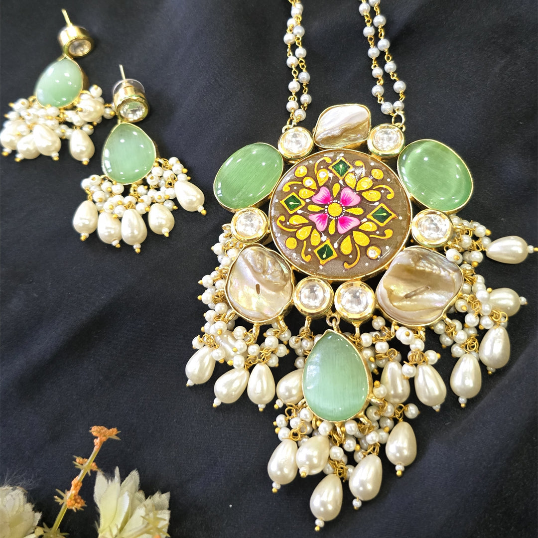 Handcrafted Meenakari Floral Pendant Necklace Set with Cat’s Eye Stones & Pearl Droplets
