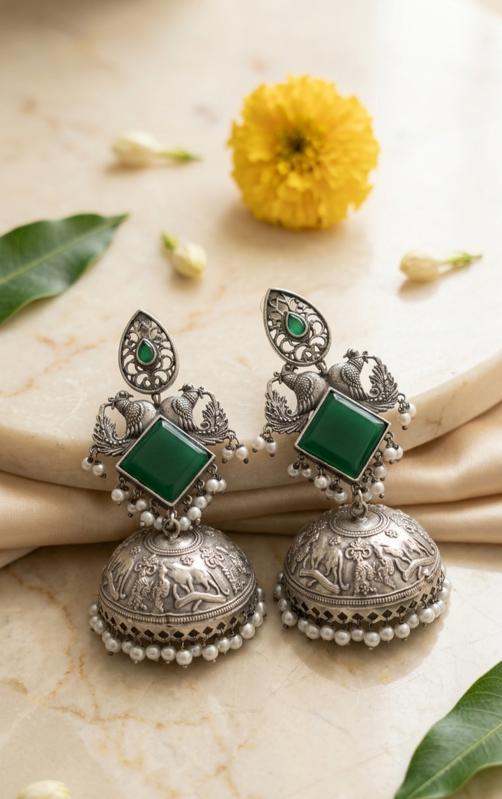 Emerald Mayur Dual-Dome Oxidised Silver Jhumkas